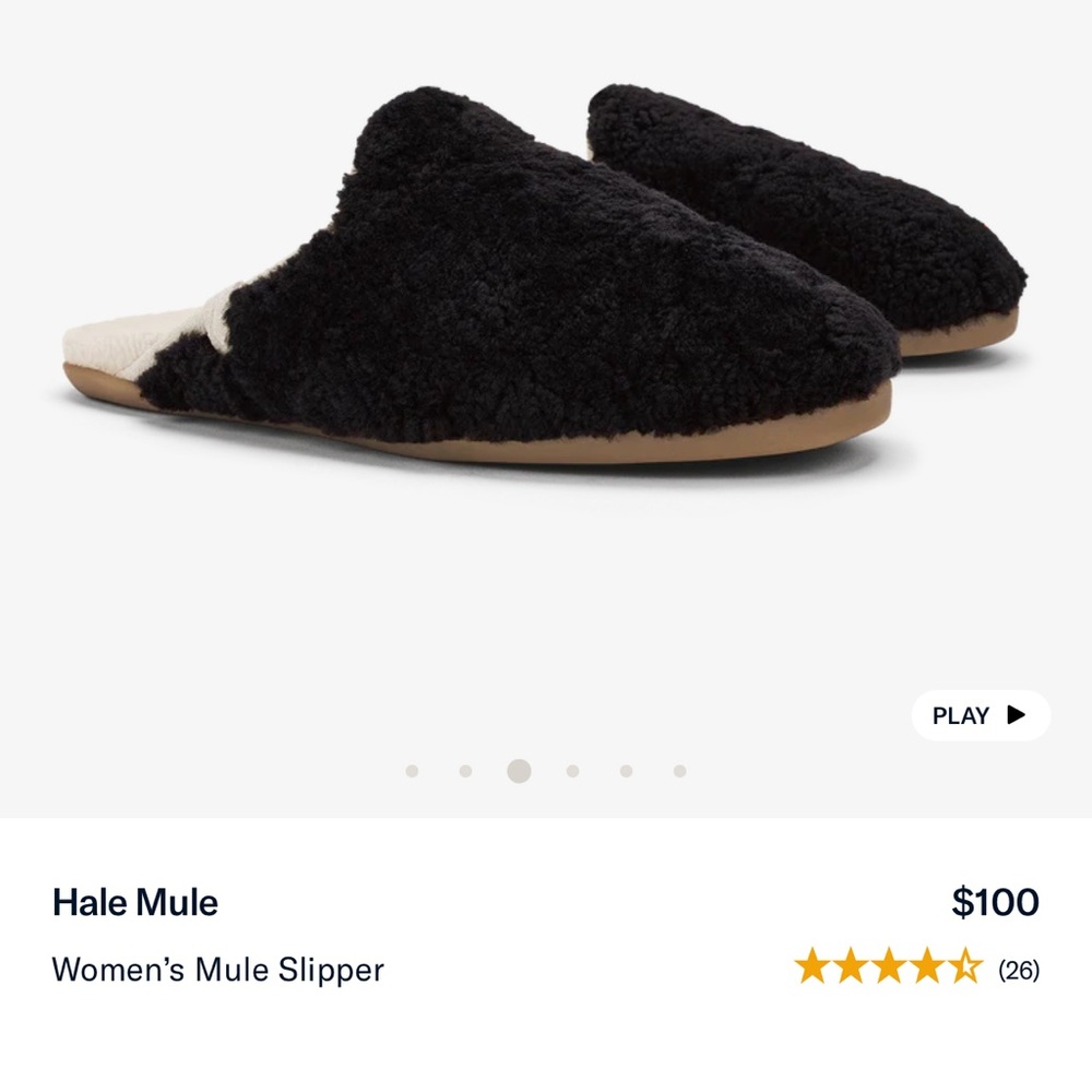 Women’s Black Olukai Slippers. Genuine shearling with fleece lining for comfort.